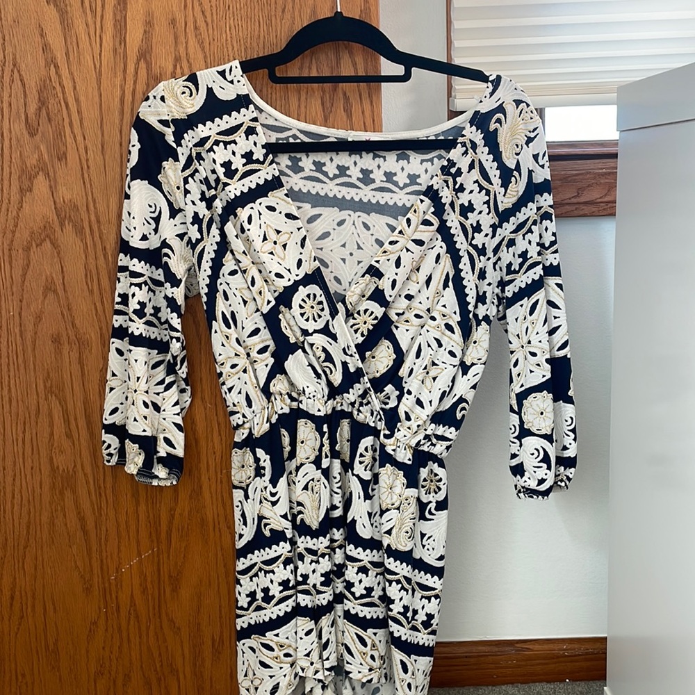 Dainty Hooligan Women’s Small Romper Dark Blue with Gold and White Design.